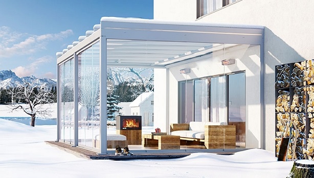Das Terrassendach Terrazza Pure im Winter, bedeckt mit Schnee, als Glasoase. Klicken um zu den Terrassendächern zu gelangen.